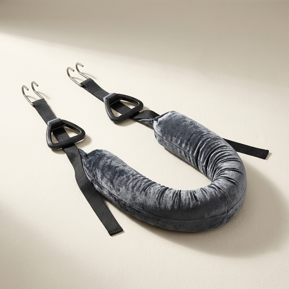 Close-up of the gray LumbarLift continuous padded support, straps, and clips